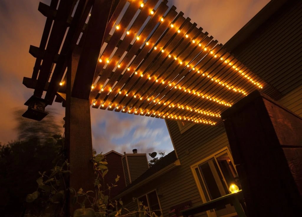 4. Turn Your Pergola Into a Cozy Outdoor Nook